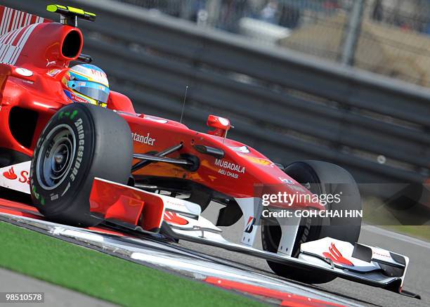 Ferrari driver Fernando Alonso of Spain drives his car during the final qualify session for Formula One's Chinese Grand Prix in Shanghai on April 17,...