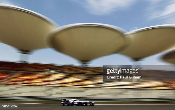 Rubens Barrichello of Brazil and Williams drives during qualifying for the Chinese Formula One Grand Prix at the Shanghai International Circuit on...