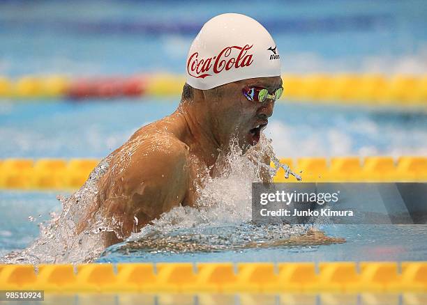 Kosuke Kitajima competes in the Men's 100m Breathstroke during the day five of the Japan Swim 2010 at Tokyo Tatsumi International Swimming Pool on...