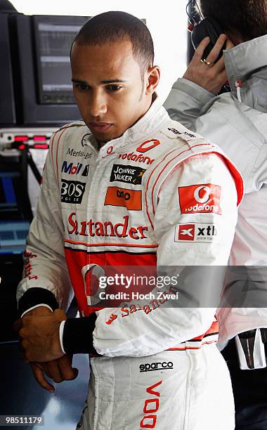 Lewis Hamilton of Great Britain and McLaren Mercedes prepares to drive during qualifying for the Chinese Formula One Grand Prix at the Shanghai...