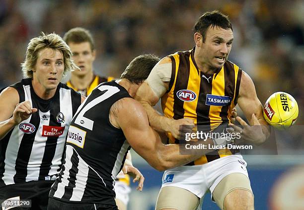 Brent Guerra of the Hawks drops the ball during the round four AFL match between the Collingwood Magpies and the Hawthorn Hawks at Melbourne Cricket...