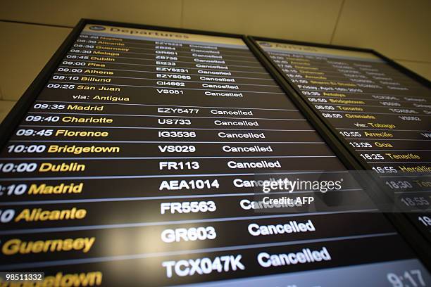 Departure board displays a list of cancelled flights at London Gatwick Airport in Hurley in West Sussex, on April 17,2010. Britain has extended a ban...