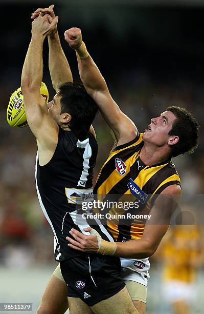 Thomas Murphy of the Hawks spoils Paul Medhurst of the Magpies during the round four AFL match between the Collingwood Magpies and the Hawthorn Hawks...