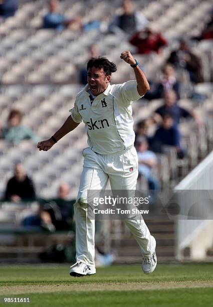 Neil Carter of Warwickshire celebrates taking the wicket of Ashwell Prince of Lancashire during the LV County Championship match between Lancashire...