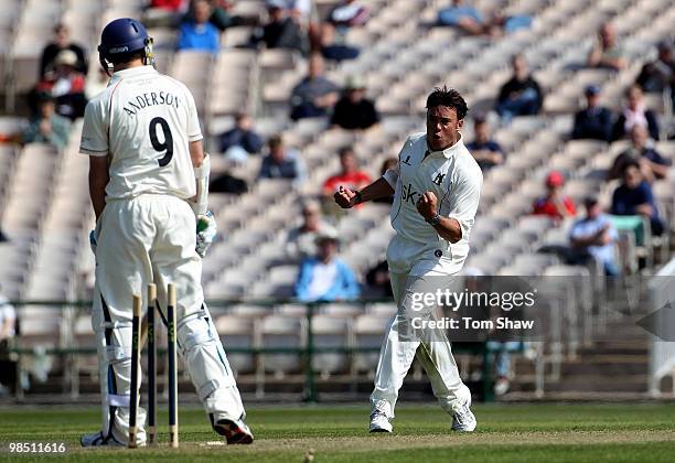 Neil Carter of Warwickshire celebrates taking the wicket of James Anderson of Lancashire during the LV County Championship match between Lancashire...