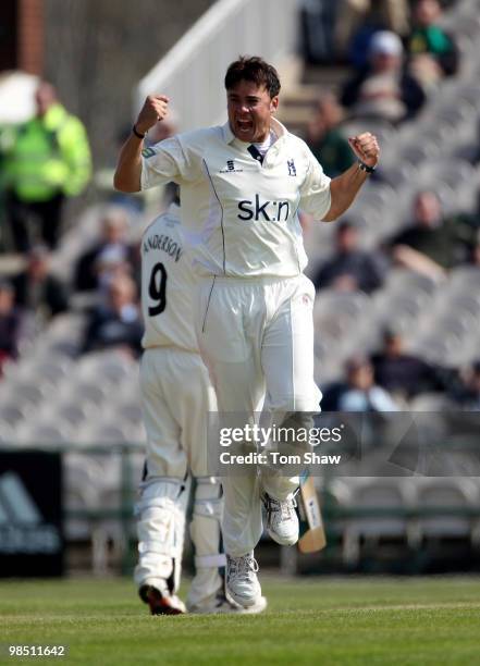 Neil Carter of Warwickshire celebrates taking the wicket of Stephen Moore of Lancashire during the LV County Championship match between Lancashire...