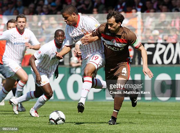 Chinedu Ede of Berlin battles for the ball with Fabio Morena of Hamburg during the Second Bundesliga match between 1.FC Union Berlin and FC St. Pauli...