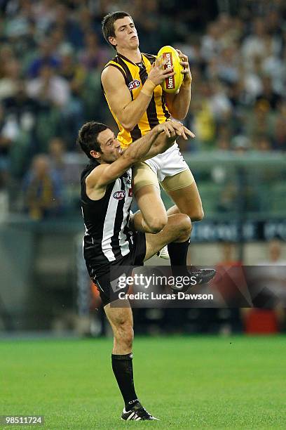 Ben Stratton of the Hawks marks the ball during the round four AFL match between the Collingwood Magpies and the Hawthorn Hawks at Melbourne Cricket...