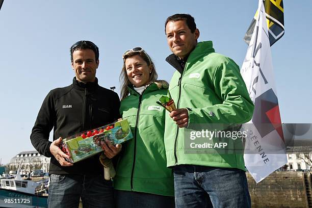 French yachtsman Franck Cammas , winner of the Jules Verne Trophy, poses with Samantha Davies and Romain Attanasio on April 17, 2010 in Concarneau,...