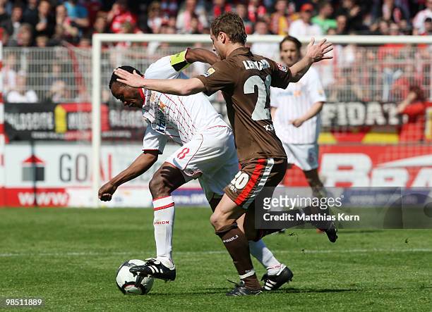 Macchambes Younga-Mouhani of Berlin battles for the ball with Matthias Lehmann of St. Pauli during the Second Bundesliga match between 1.FC Union...