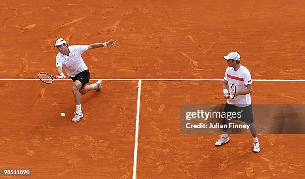 Simon Aspelin of Sweden and Paul Hanley of Australia in action in the doubles match against Mahesh Bhupathi of India and Max Mirnyi of Belarus during...