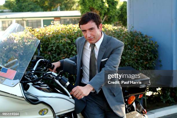 Steve Coogan an English comedian sitting outside a seedy motel , he plays a leading role in the film The Alibi photographed July 14, 2004 in Studio...