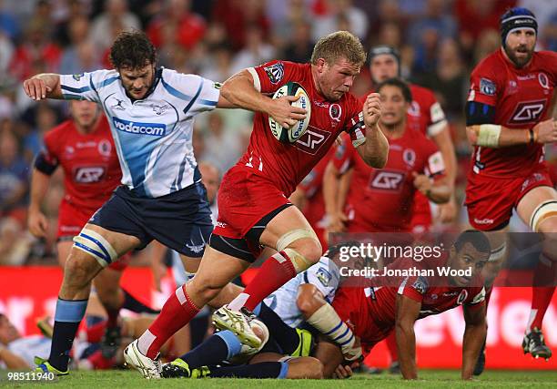 Daniel Braid of the Reds in attack during the round 10 Super 14 match between the Reds and the Bulls at Suncorp Stadium on April 17, 2010 in...