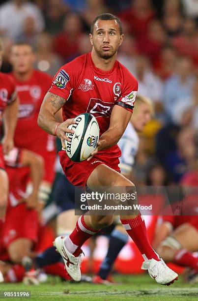 Quade Cooper of the Reds in attack during the round 10 Super 14 match between the Reds and the Bulls at Suncorp Stadium on April 17, 2010 in...