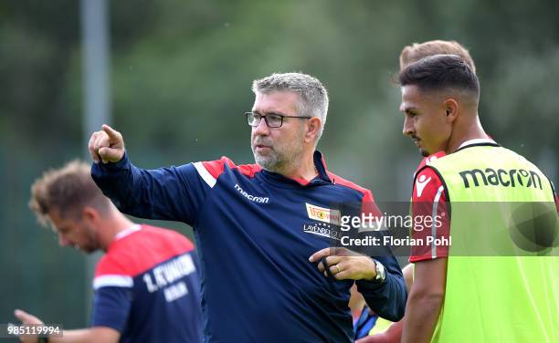 Coach Urs Fischer talks to Kenny Prince Redondo of 1 FC Union Berlin during the first training of season 2018/2019 at Trainingsgelaende of Stadion an...