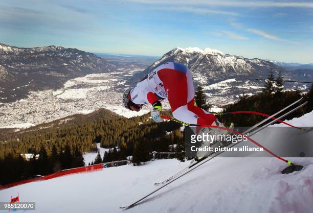 Beat Feuz from Switzerland takes off on his first training descent during the men's training in Garmisch-Partenkirchen, Germany, 25 January 2018....