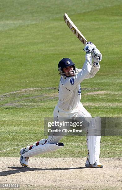 Rana Naved of Sussex hits a six during the LV County Championship Division Two match between Sussex and Surrey at the County Ground on April 17, 2010...