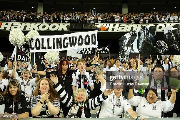 Collingwood fans celebrate after winning the round four AFL match between the Collingwood Magpies and the Hawthorn Hawks at Melbourne Cricket Ground...