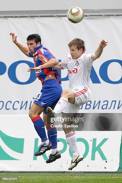 Mark Gonzales of PFC CSKA Moscow battles for the ball with Oleg Kuzmin of FC Lokomotiv Moscow during the Russian Football League Championship match...