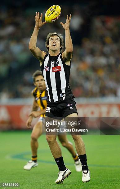 Steele Sidebottom of the Magpies marks the ball during the round four AFL match between the Collingwood Magpies and the Hawthorn Hawks at Melbourne...