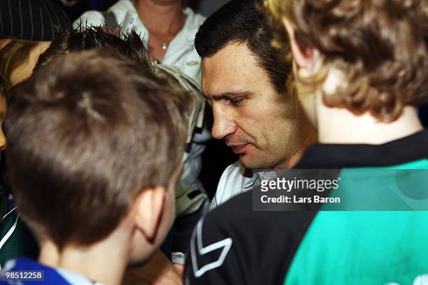 Vitali Klitschko is seen with young fans at the Schalke museum at the Veltins Arena on April 17, 2010 in Gelsenkirchen, Germany. The WBC Heavyweight...