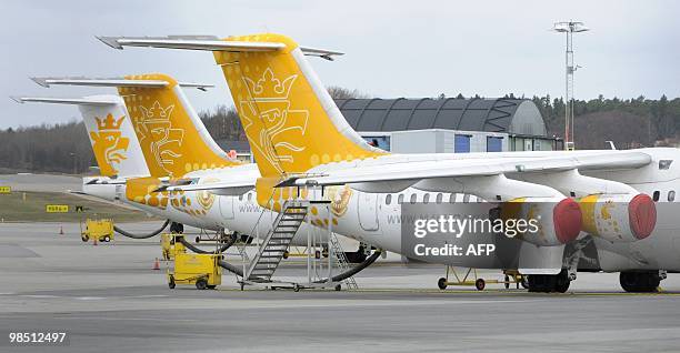 Covered engines of Malmo Aviation�s RJ series aircrafts are parked at Bromma airport in Stockholm on April 17, 2010. Millions of people faced...