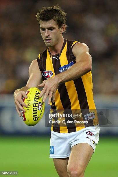 Brendan Whitecross of the Hawks kicks during the round four AFL match between the Collingwood Magpies and the Hawthorn Hawks at Melbourne Cricket...