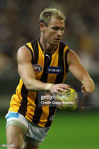 Michael Osborne of the Hawks kicks during the round four AFL match between the Collingwood Magpies and the Hawthorn Hawks at Melbourne Cricket Ground...