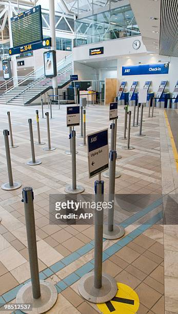 The empty check-in area for Scandinavian Airlines' domestic departures is seen at Arlanda airport in Stockholm on April 17, 2010. Millions of people...
