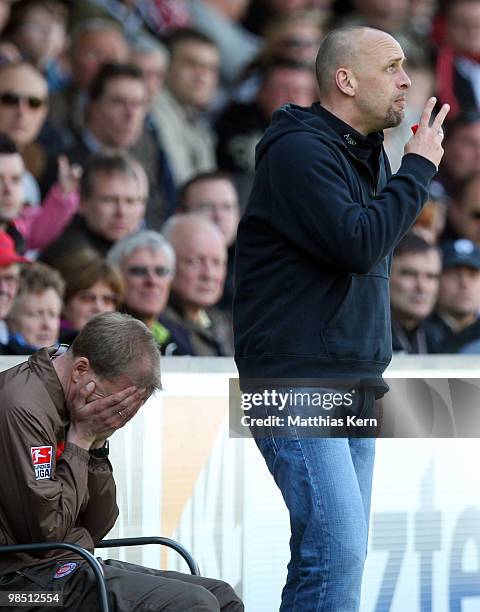 Head coach Holger Stanislawski of Hamburg and assistant coach Andre Trulsen show their frustration during the Second Bundesliga match between 1.FC...