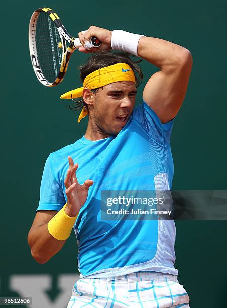 Rafael Nadal of Spain plays a forehand in his match against David Ferrer of Spain during day six of the ATP Masters Series at the Monte Carlo Country...