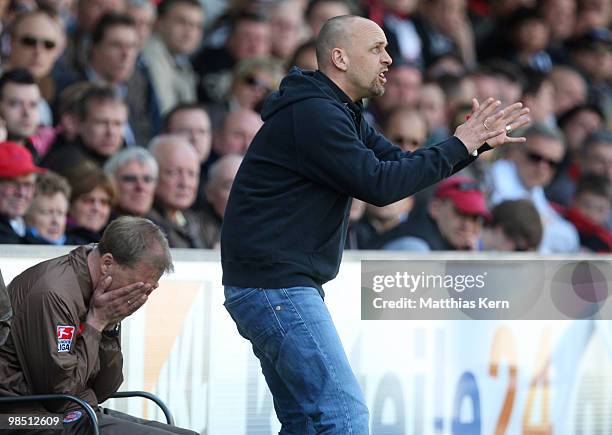 Head coach Holger Stanislawski of Hamburg and assistant coach Andre Trulsen show their frustration during the Second Bundesliga match between 1.FC...