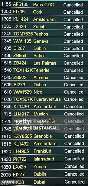 An information board displays cancelled flights at Birmingham International Airport in Birmingham, central England, April 17, 2010. Millions of...