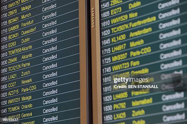 An information board displays cancelled flights at Birmingham International Airport in Birmingham, central England, April 17, 2010. Millions of...