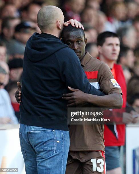 Head coach Holger Stanislawski of Hamburg and Charles Takyi are seen during the Second Bundesliga match between 1.FC Union Berlin and FC St. Pauli at...