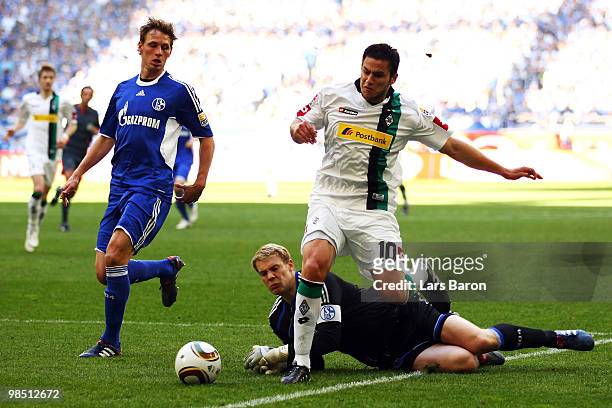 Raul Bobadilla of Moenchengladbach gets the ball before goalkeeper Manuel Neuer of Schalke and scores the second goal during the Bundesliga match...