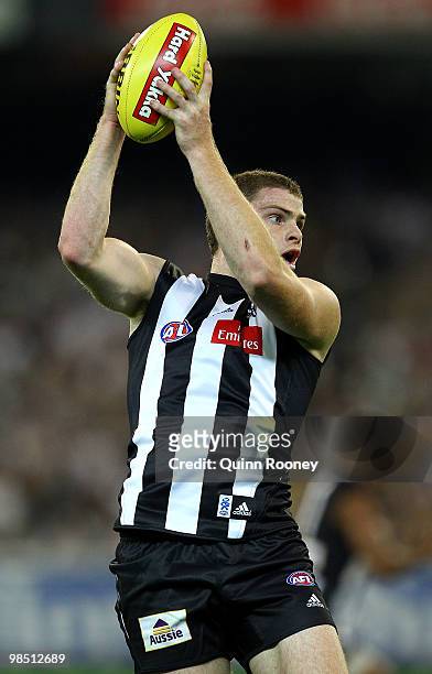 Heath Shaw of the Magpies marks during the round four AFL match between the Collingwood Magpies and the Hawthorn Hawks at Melbourne Cricket Ground on...