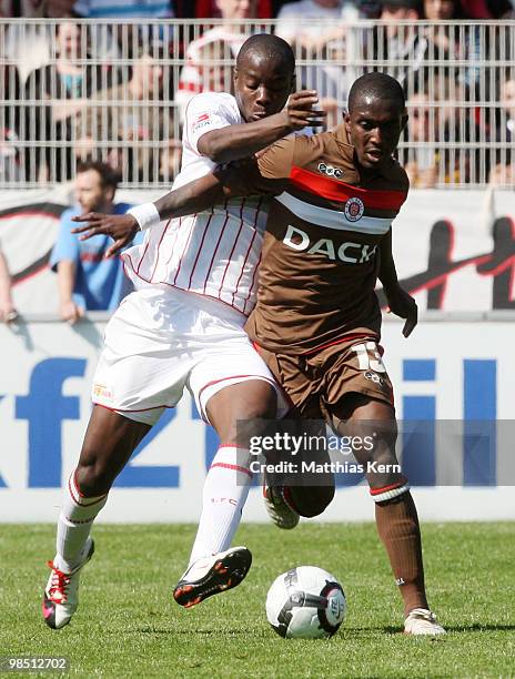John Jairo Mosquera of Berlin battles for the ball with Charles Takyi of Hamburg during the Second Bundesliga match between 1.FC Union Berlin and FC...