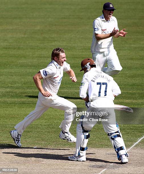 Luke Wright of Sussex celebrates the wicket of Mark Ramprakash of Surrey during the LV County Championship Division Two match between Sussex and...