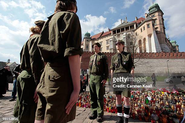 Members of the polish scouts youth organization stand guard in honour for the late polish President Lech Kaczynski and his wife Maria in front of the...