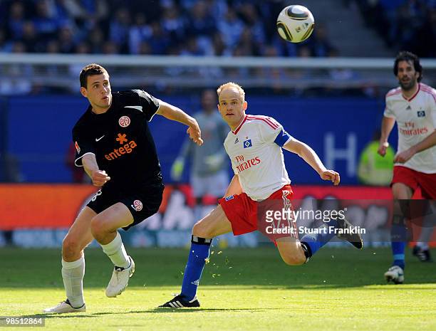 David Jarolim of Hamburg and Radoslav Zabavnik of Mainz battle for the ball during the Bundesliga match between Hamburger SV and FSV Mainz 05 at HSH...