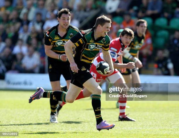 Chris Ashton of Northampton breaks away to score the first try during the Guinness Premiership match between Northampton Saints and Gloucester at...