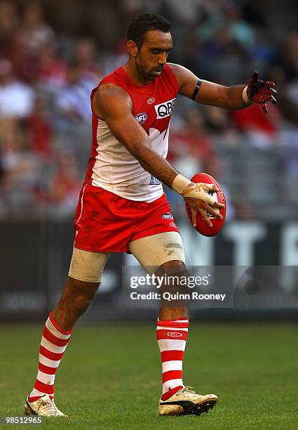 Adam Goodes of the Swans kicks during the round four AFL match between the North Melbourne Kangaroos and the Sydney Swans at Etihad Stadium on April...