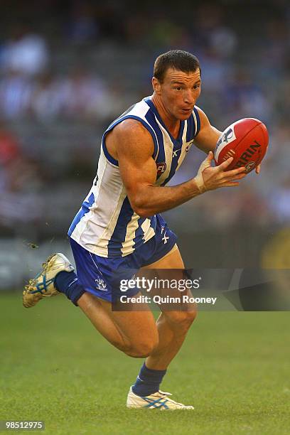 Brent Harvey of the Kangaroos runs with the ball during the round four AFL match between the North Melbourne Kangaroos and the Sydney Swans at Etihad...