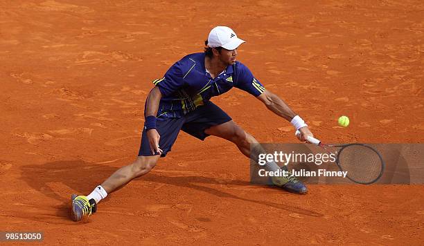 Fernando Verdasco of Spain in action against Novak Djokovic of Serbia during day six of the ATP Masters Series at the Monte Carlo Country Club on...