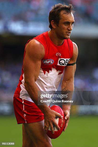 Daniel Bradshaw of the Swans kicks during the round four AFL match between the North Melbourne Kangaroos and the Sydney Swans at Etihad Stadium on...