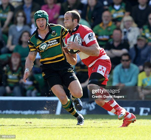 Charlie Sharples of Gloucester moves past Bruce Reihana during the Guinness Premiership match between Northampton Saints and Gloucester at Franklin's...