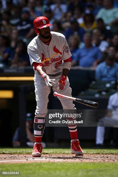 Dexter Fowler of the St. Louis Cardinals draws a walk in the second inning against the Milwaukee Brewers at Miller Park on June 24, 2018 in...