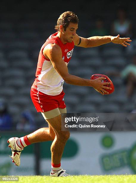 Josh Kennedy of the Swans kicks during the round four AFL match between the North Melbourne Kangaroos and the Sydney Swans at Etihad Stadium on April...