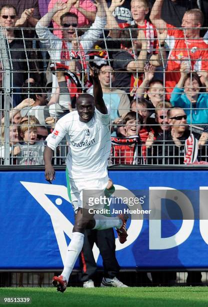 Papiss Demba Cisse of Freiburg celebrates after scoring his team's second goal during the Bundesliga match between SC Freiburg and 1.FC Nuernberg at...